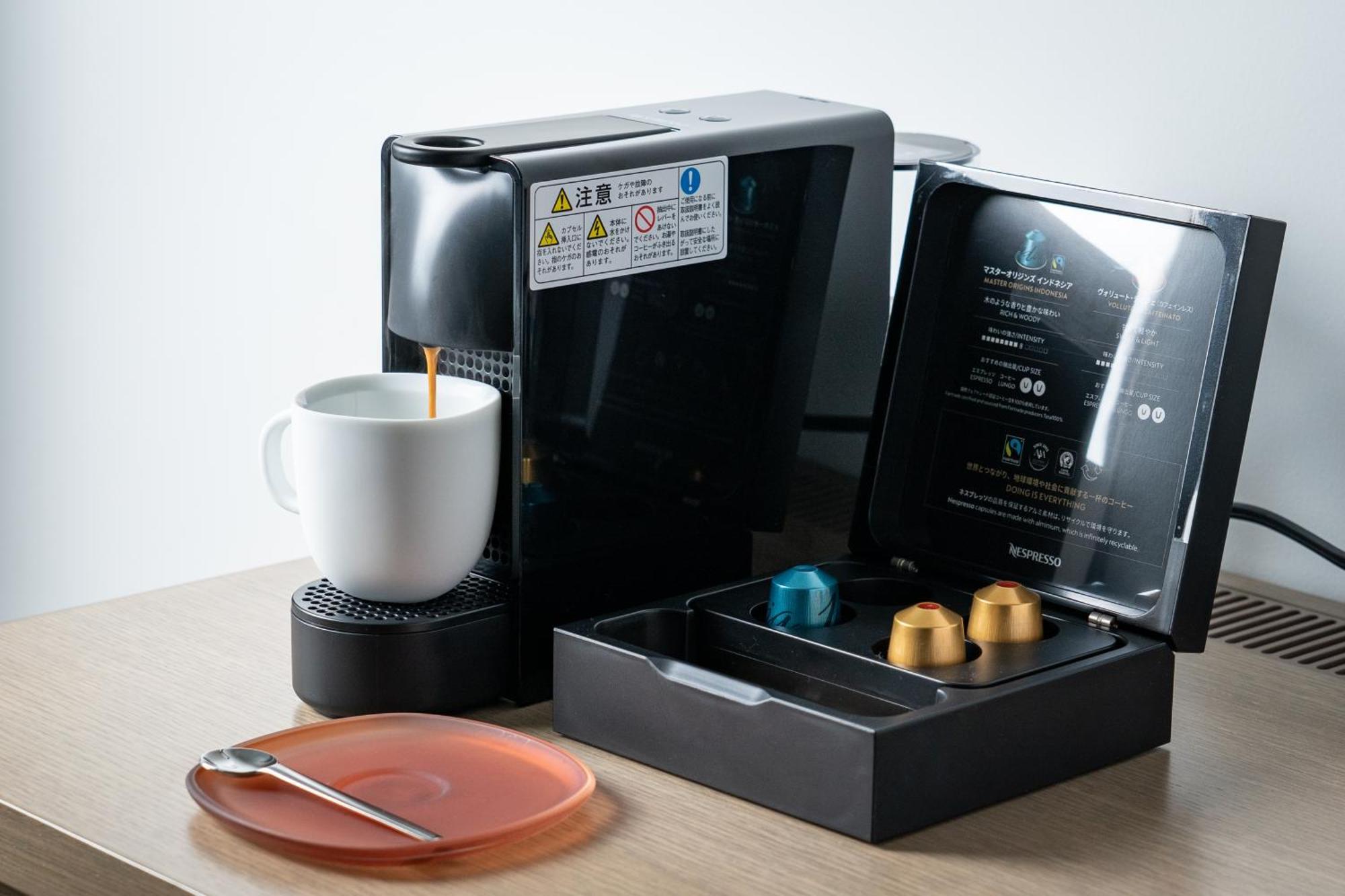 The Royal Park Hotel Iconic Kyoto Dış mekan fotoğraf A Nespresso coffee machine